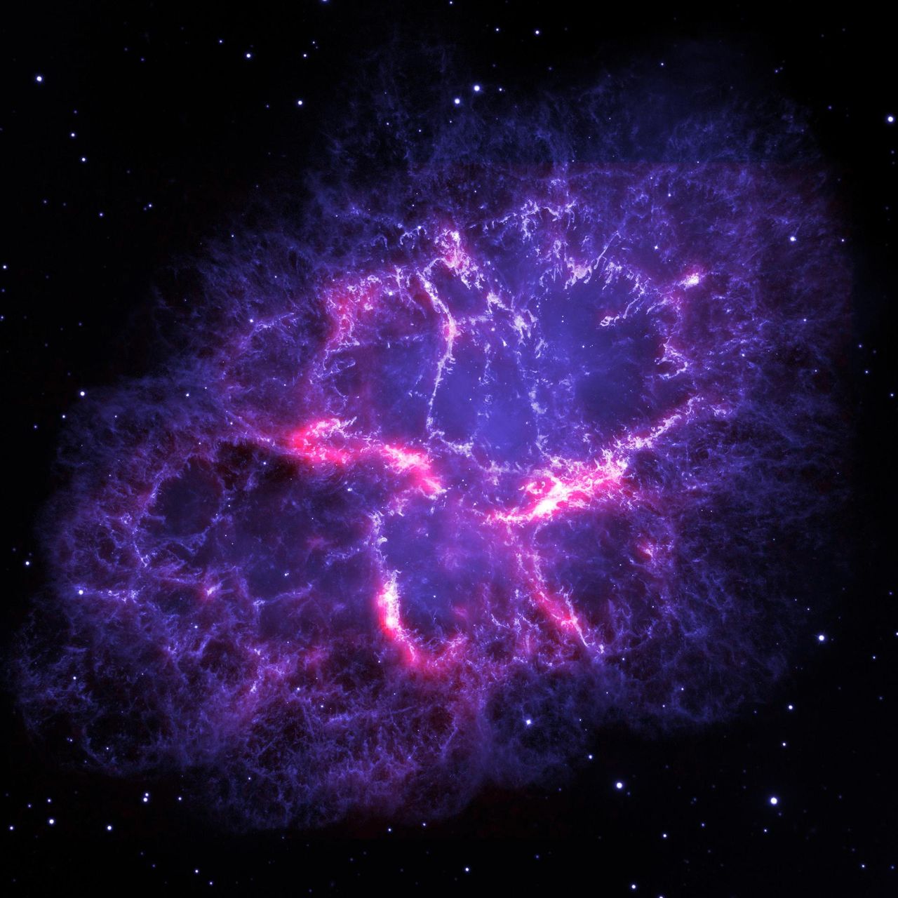 A NASA image of the Crab nebula, imaged by Herschel Space Observatory and the Hubble Space Telescope.